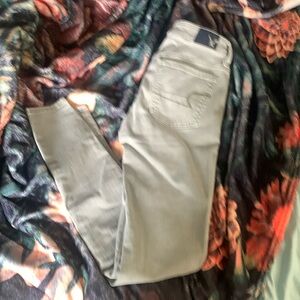 AE super super stretch light moss green jeggings